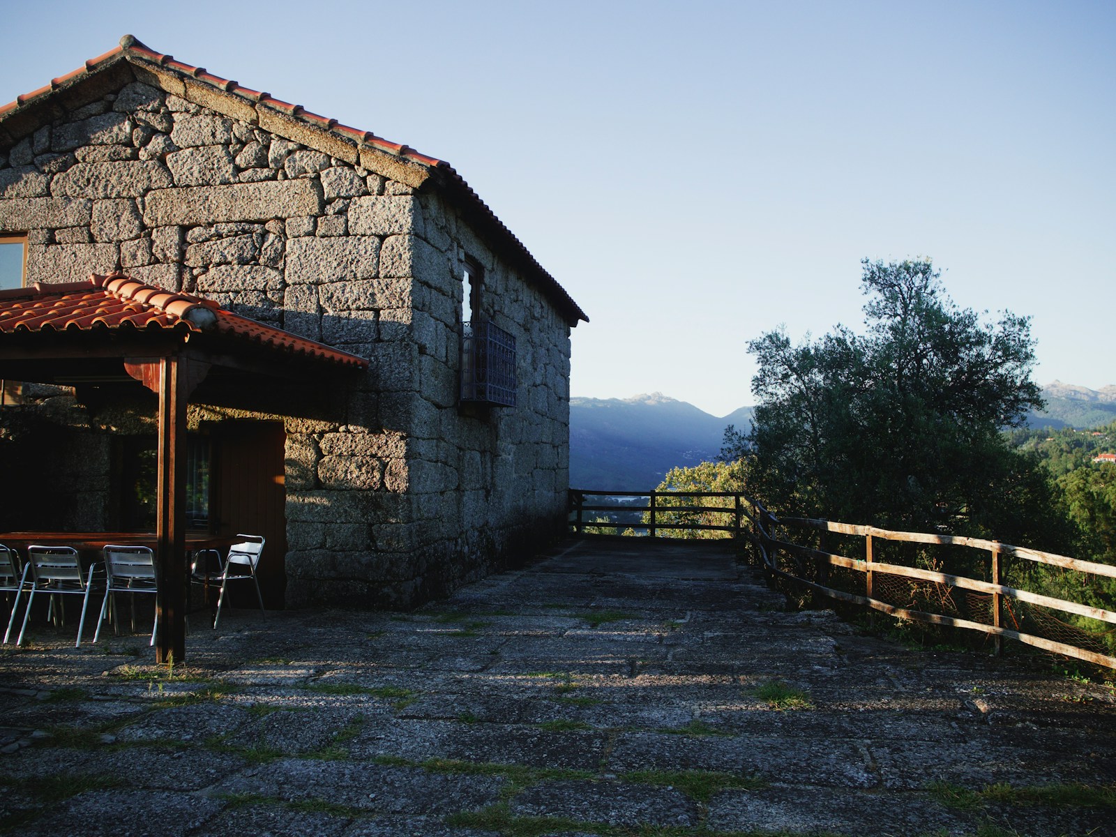 Stone cottage on a wooded hillside near Penela